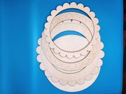 Double Scallop Circle Small - Unfinished Wood Display Frame, different perspective #2. Select this picture to zoom in