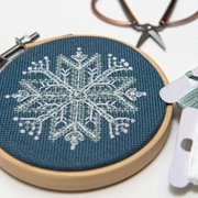 Mini Snowflake Ornaments - Christmas Cross Stitch Pattern, different perspective #1. Select this picture to zoom in