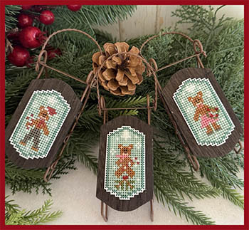 Three Bears Sled Ride - Christmas Cross Stitch Pattern, zoomed in. Select this picture to zoom back out.