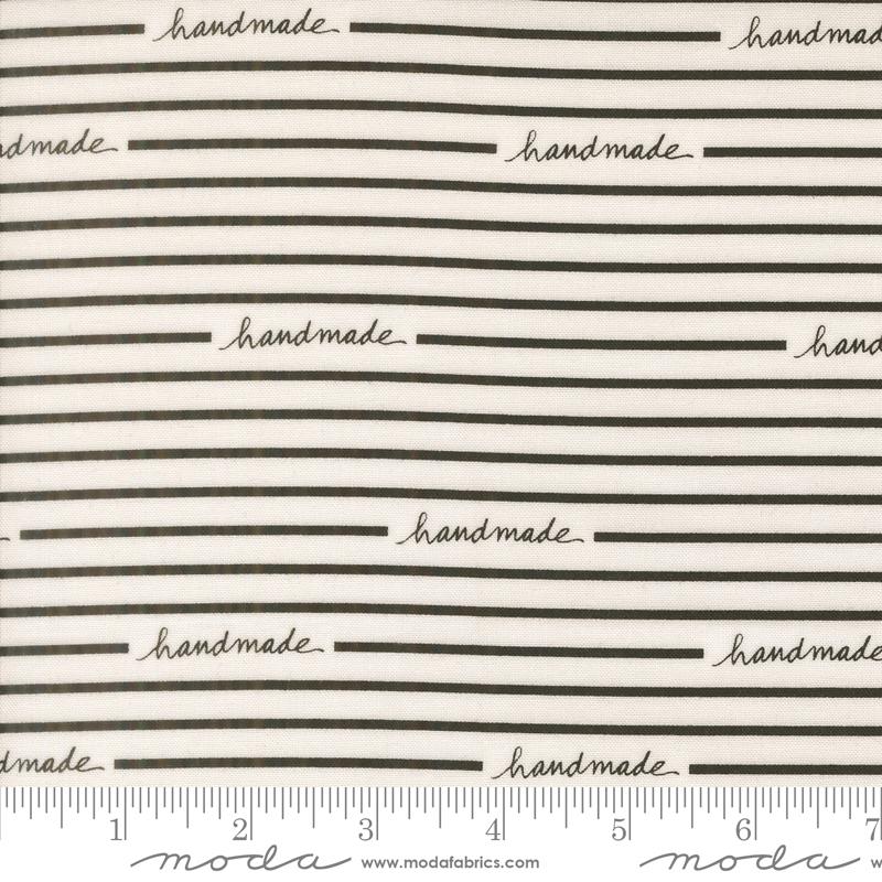 Makers Delight Handmade White Black - Quilt Fabric, zoomed in. Select this picture to zoom back out.