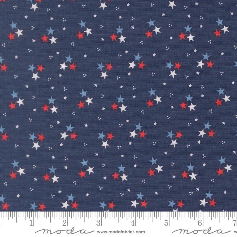 Midsummer Stars Navy - Quilt Fabric, zoomed in. Select this picture to zoom back out.