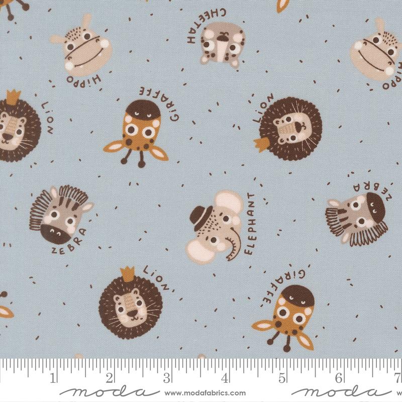 Wildly Cute Safari Heads Sky - Quilt Fabric, zoomed in. Select this picture to zoom back out.