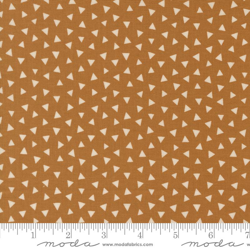Wildly Cute Safari Triangles Golden - Quilt Fabric, zoomed in. Select this picture to zoom back out.