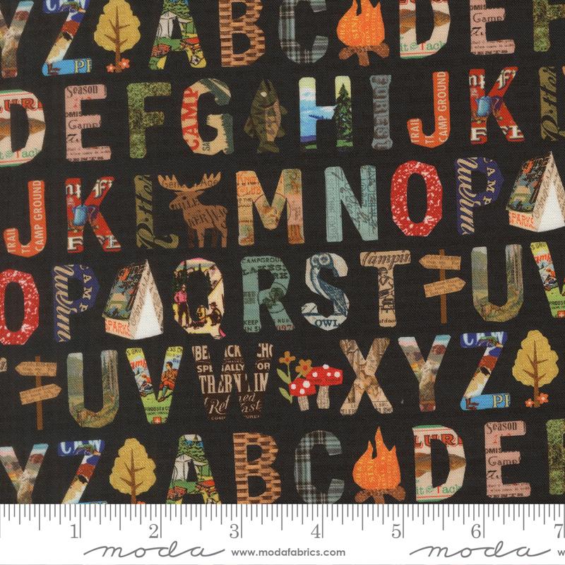 Paper Trails Alphabet Navy - Quilt Fabric, zoomed in. Select this picture to zoom back out.