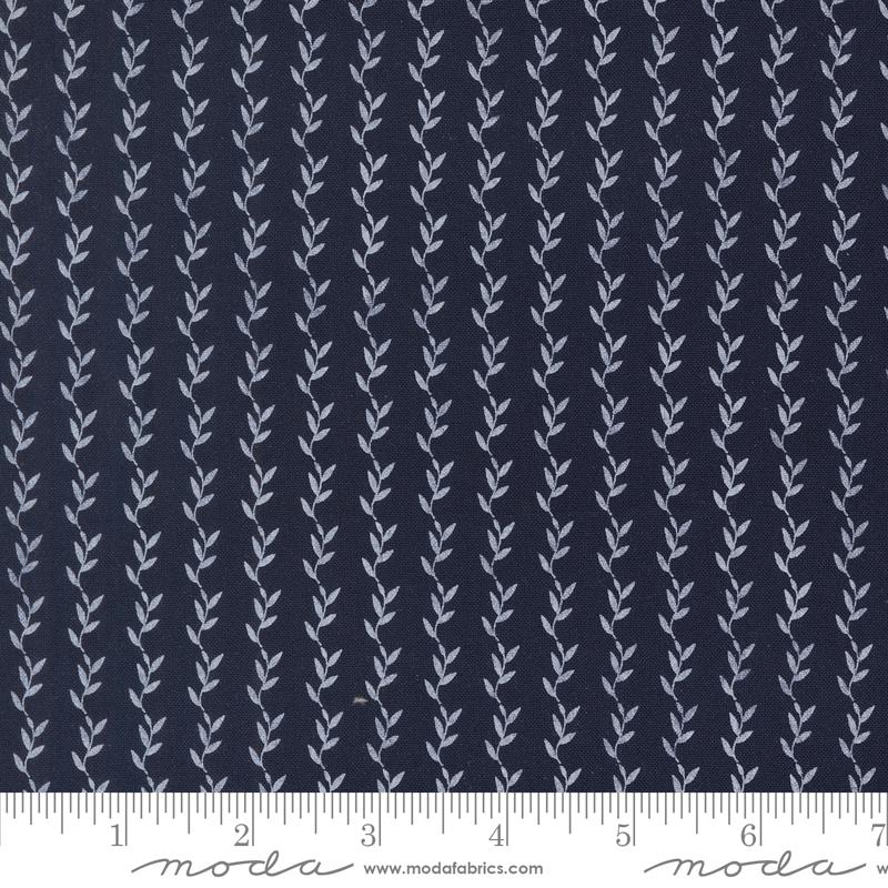 Catching Sunshine Vines Navy - Quilt Fabric, zoomed in. Select this picture to zoom back out.