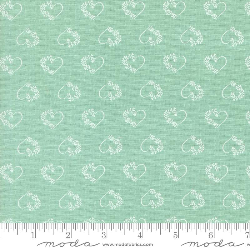 Catching Sunshine Hearts Aqua - Quilt Fabric, zoomed in. Select this picture to zoom back out.