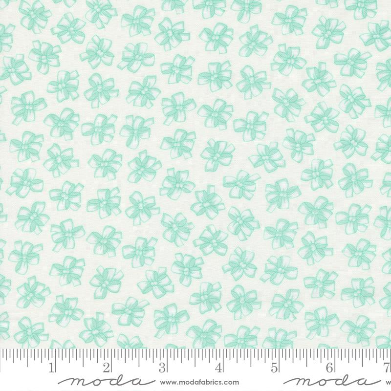 Lighthearted Ribbon Cream - Novelty Bows - Quilt Fabric, zoomed in. Select this picture to zoom back out.
