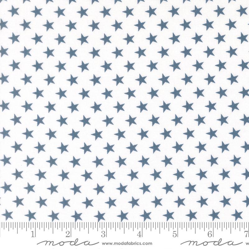 Stars And Stripes Stars White Blue - Quilt Fabric, zoomed in. Select this picture to zoom back out.