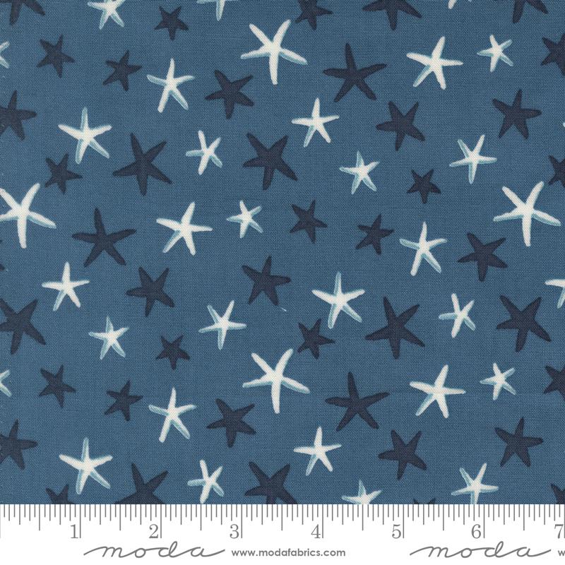 Seaside Stars Ocean Blue - Quilt Fabric, zoomed in. Select this picture to zoom back out.