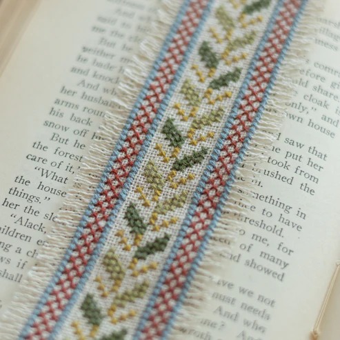 Folk Fabric Sampler Ivory - Cross Stitch Kit, different perspective #3, zoomed in. Select this picture to zoom back out.