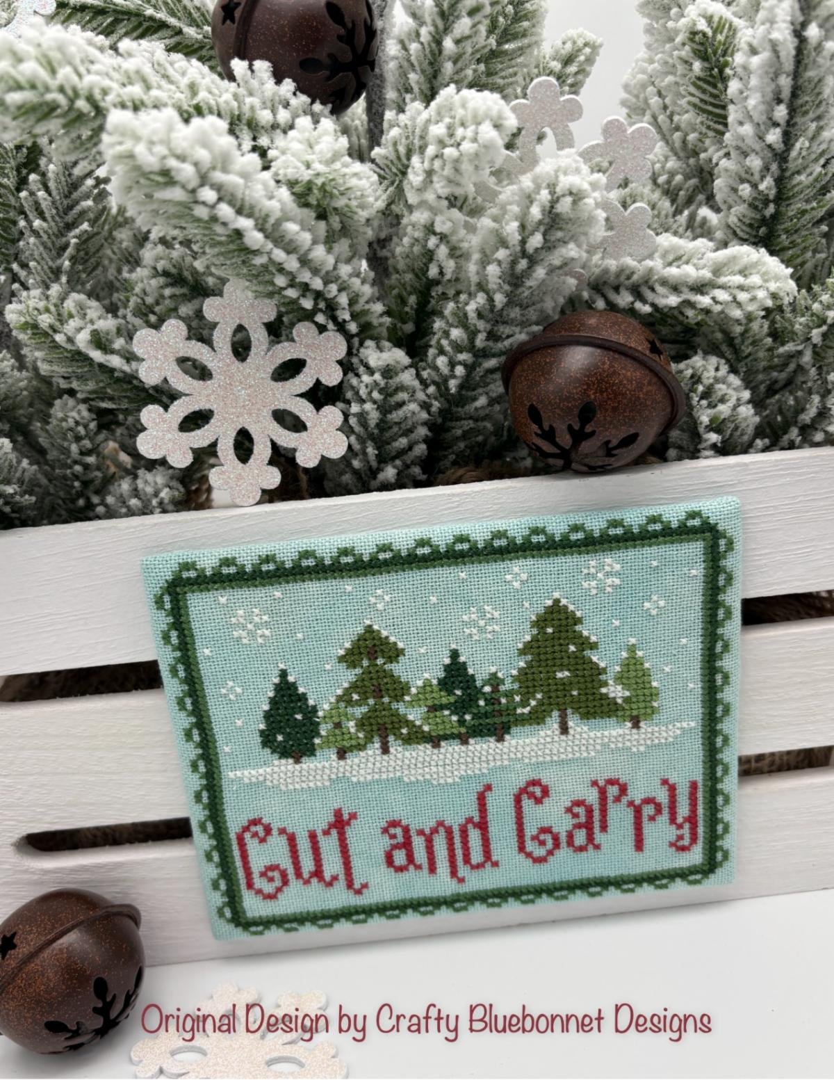 Cut and Carry - Christmas Cross Stitch Pattern, zoomed in. Select this picture to zoom back out.