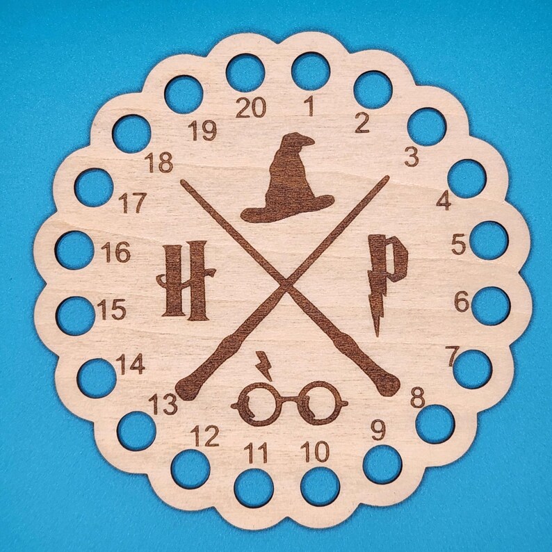 Harry Potter Crossed Wands Circle - Floss Organizer, different perspective #2, zoomed in. Select this picture to zoom back out.