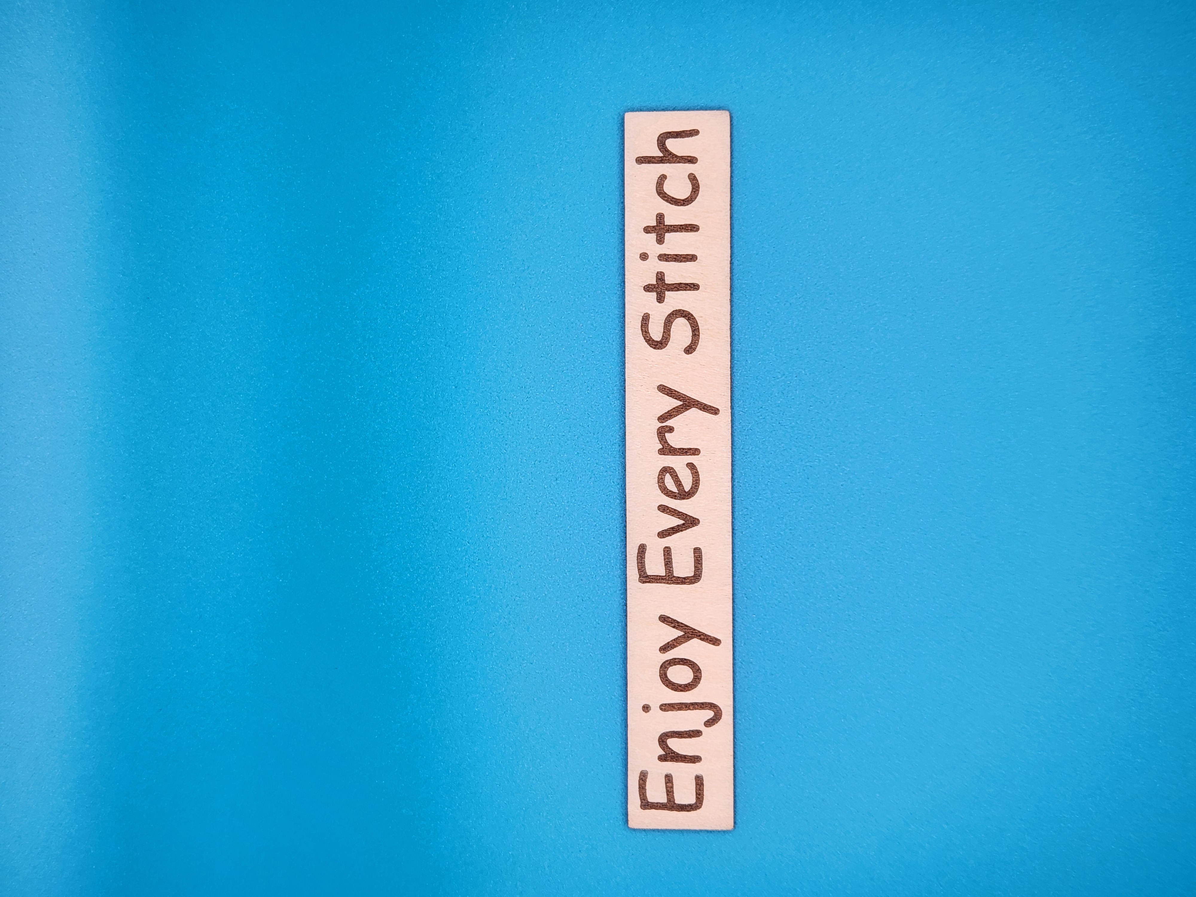 Enjoy Every Stitch - Line Keeper, zoomed in. Select this picture to zoom back out.