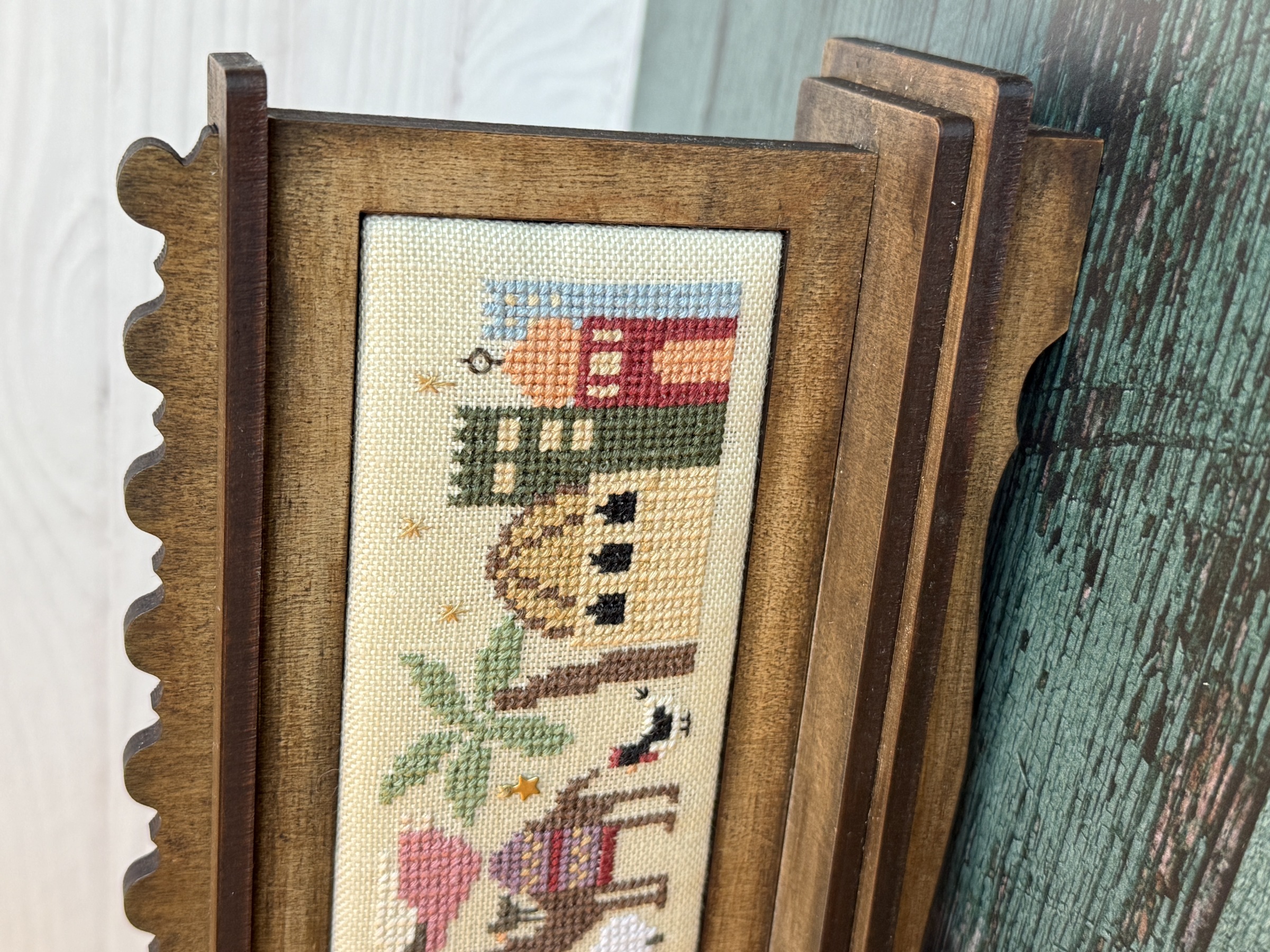 The Landing - Unfinished Embroidery Display, different perspective #1, zoomed in. Select this picture to zoom back out.