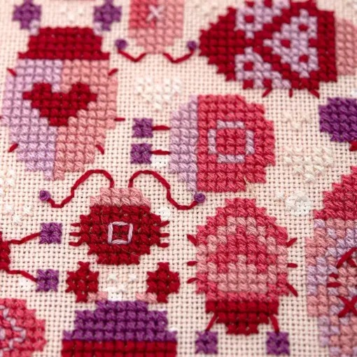 Lovebugs - Valentines Cross Stitch Pattern, different perspective #1, zoomed in. Select this picture to zoom back out.