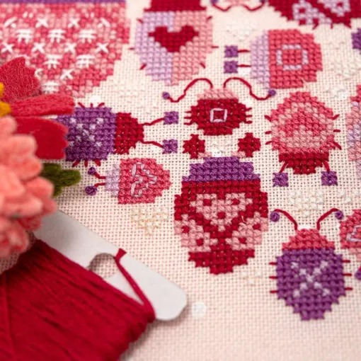 Lovebugs - Valentines Cross Stitch Pattern, different perspective #2, zoomed in. Select this picture to zoom back out.