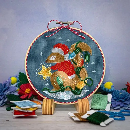 Squirrel's Bright Winter Night Ornament - Cross Stitch, zoomed in. Select this picture to zoom back out.