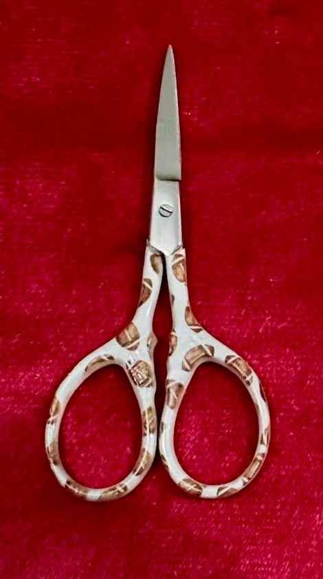 Footballs - Scissors