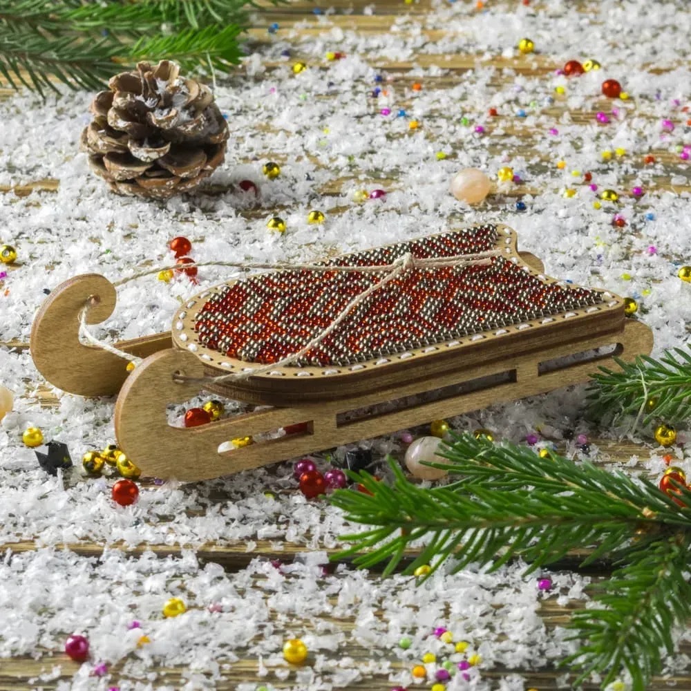 Dark Red Sled - Christmas Ornament Wooden Bead Kit, zoomed in. Select this picture to zoom back out.