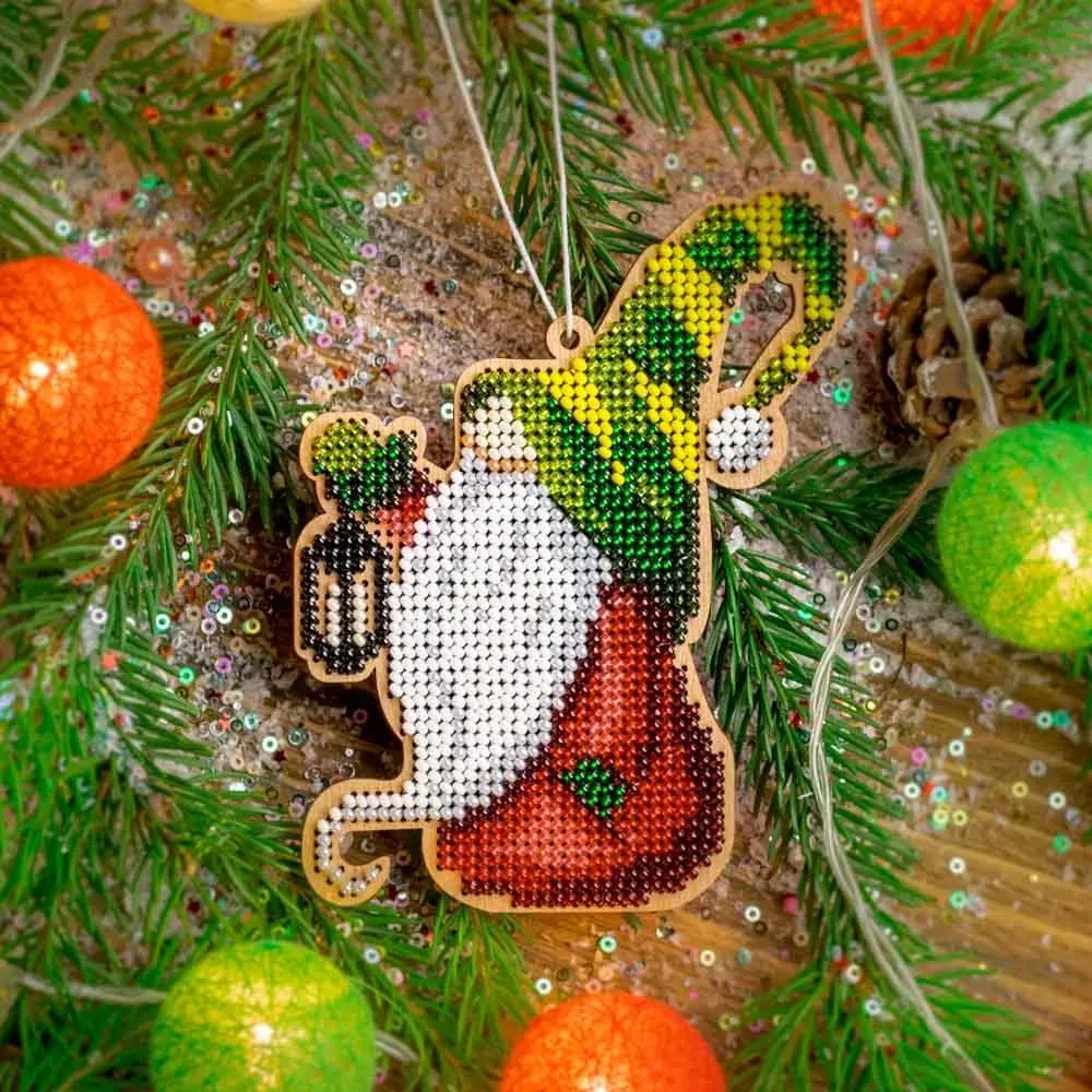 Gnome with Lantern - Christmas Ornament Wooden Bead Kit, zoomed in. Select this picture to zoom back out.