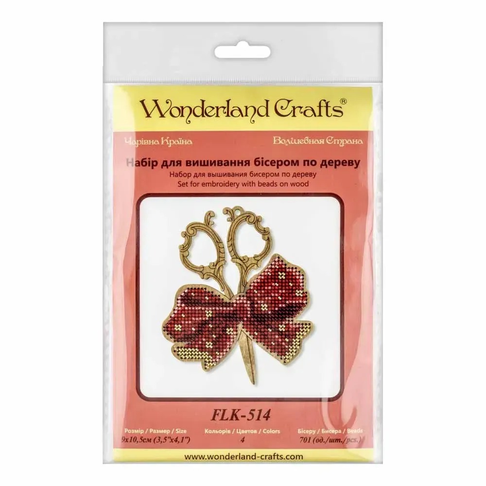 Scissors with Bow - Christmas Ornament Wooden Bead Kit, different perspective #1, zoomed in. Select this picture to zoom back out.