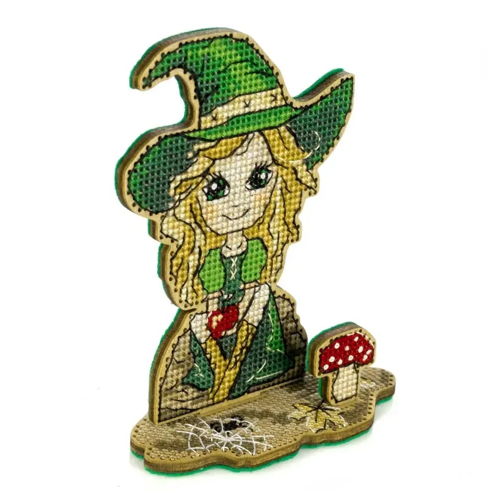 Little Witch In Green - Halloween Cross Stitch Kit, different perspective #1, zoomed in. Select this picture to zoom back out.