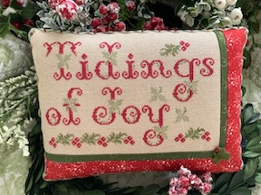 Tidings of Joy - Christmas Cross Stitch Pattern, different perspective #1, zoomed in. Select this picture to zoom back out.