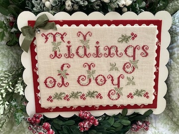 Tidings of Joy - Christmas Cross Stitch Pattern, zoomed in. Select this picture to zoom back out.