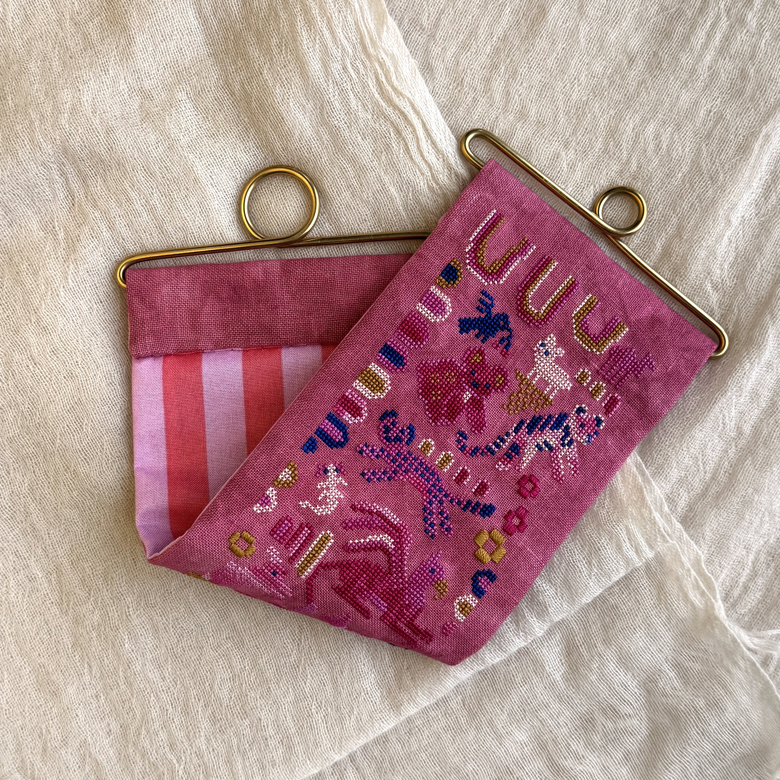 Pink Menagerie - Cross Stitch Pattern, different perspective #2, zoomed in. Select this picture to zoom back out.