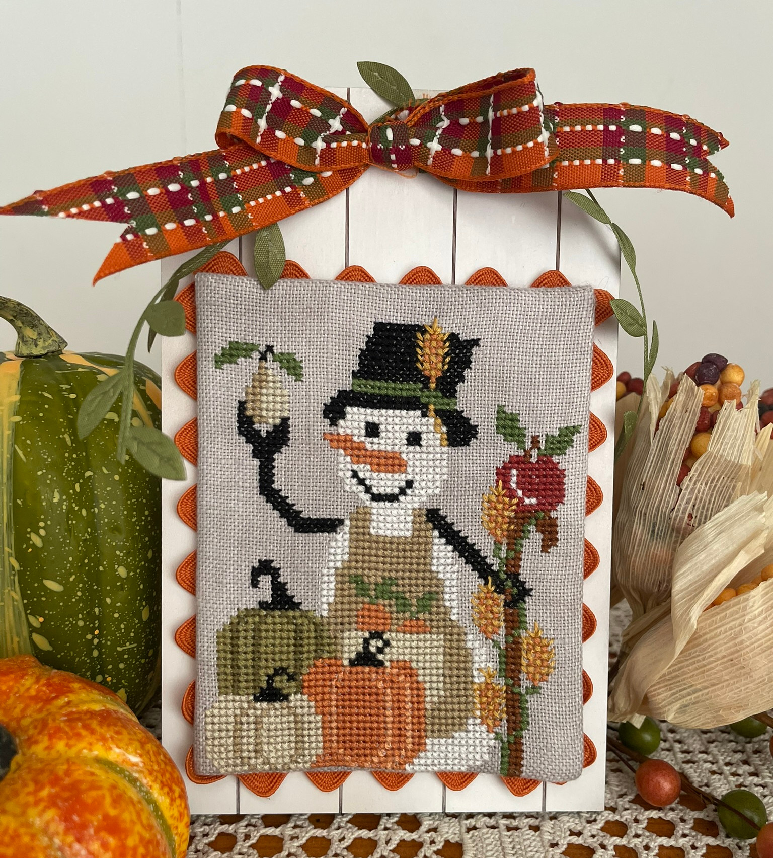 The Pumpkins' Snowman - Cross Stitch Pattern, zoomed in. Select this picture to zoom back out.
