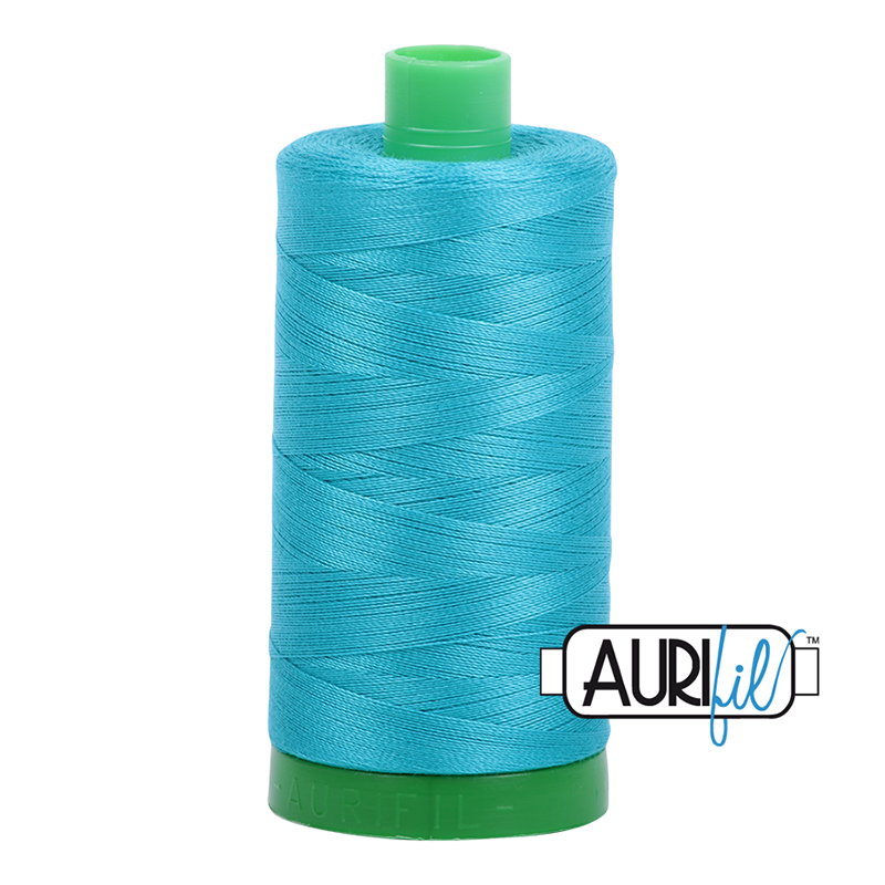 Aurifil 40wt Thread #2810 - 1094 yards, zoomed in. Select this picture to zoom back out.