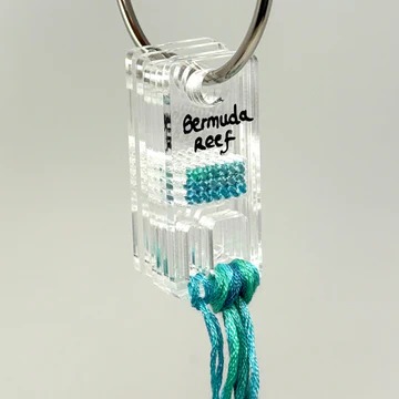 Blank Stitchable Clear Acrylic Floss Drops - Set of 20, zoomed in. Select this picture to zoom back out.