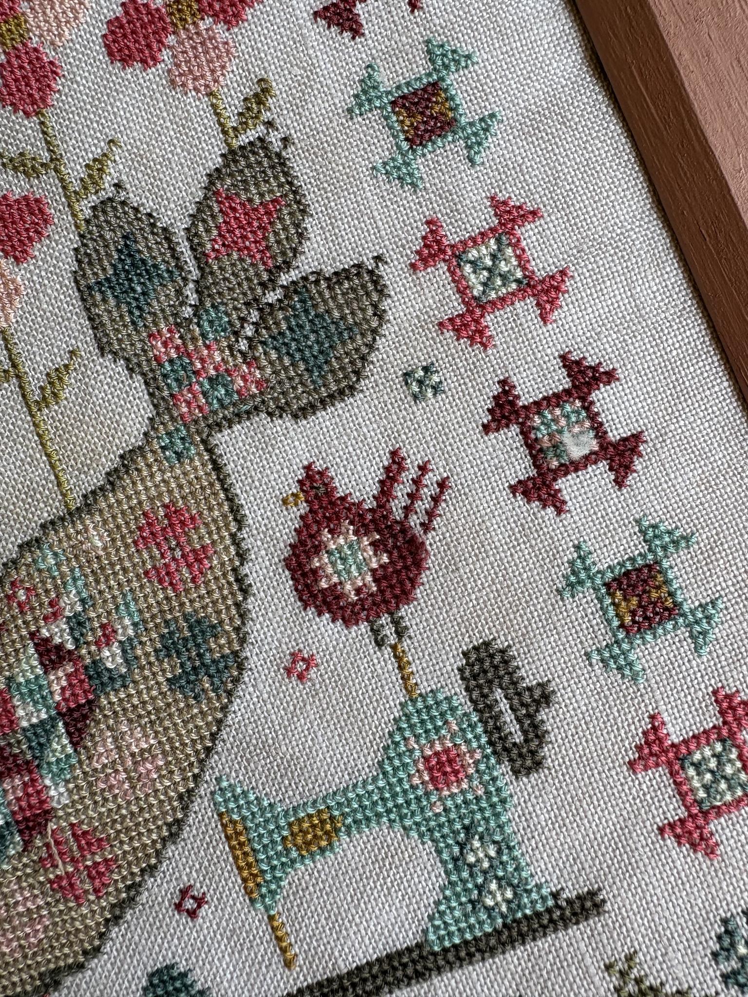 Quilty Bird - Cross Stitch Pattern, different perspective #1, zoomed in. Select this picture to zoom back out.