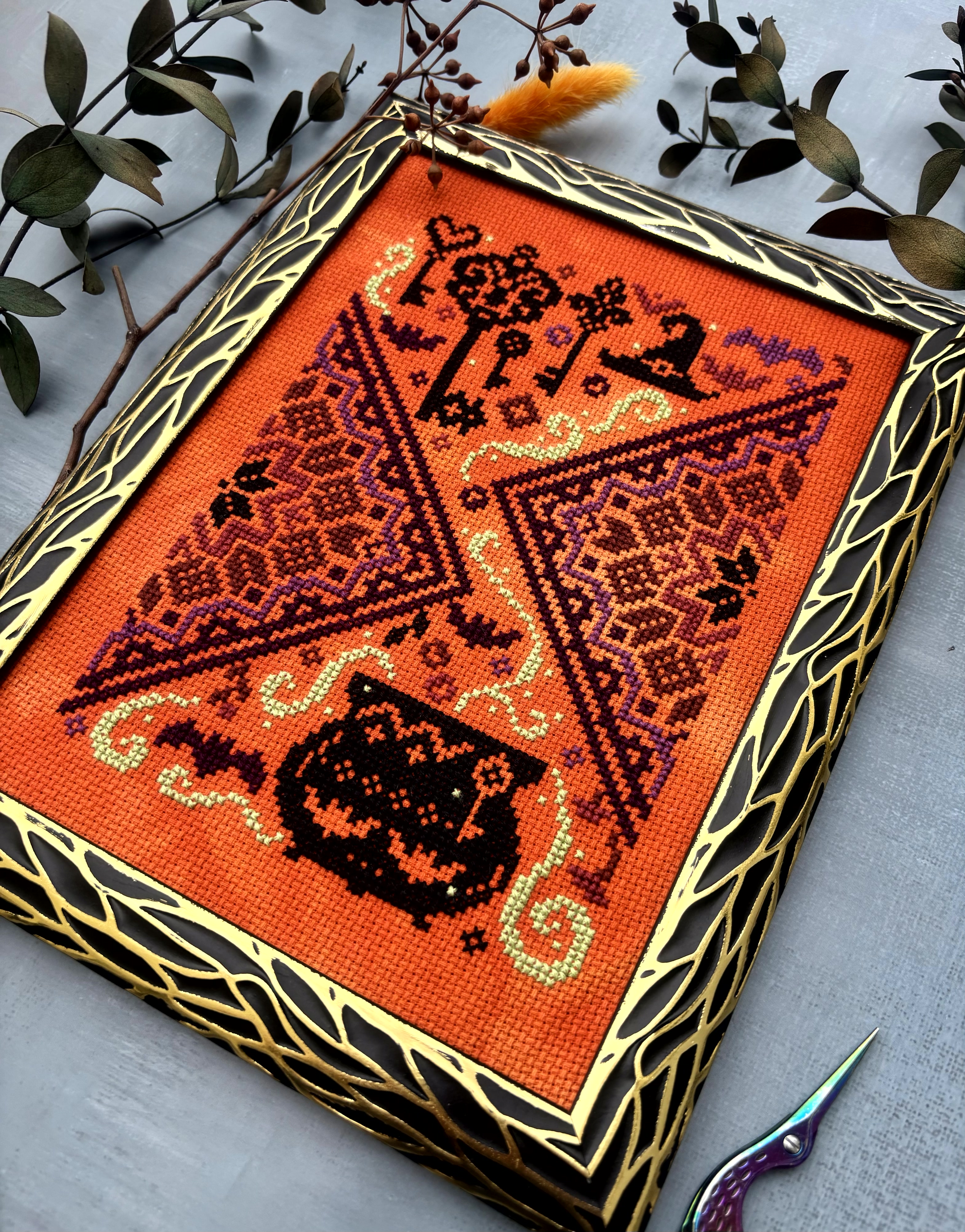 The Cauldron and the Key - Halloween Cross Stitch Pattern, different perspective #1, zoomed in. Select this picture to zoom back out.