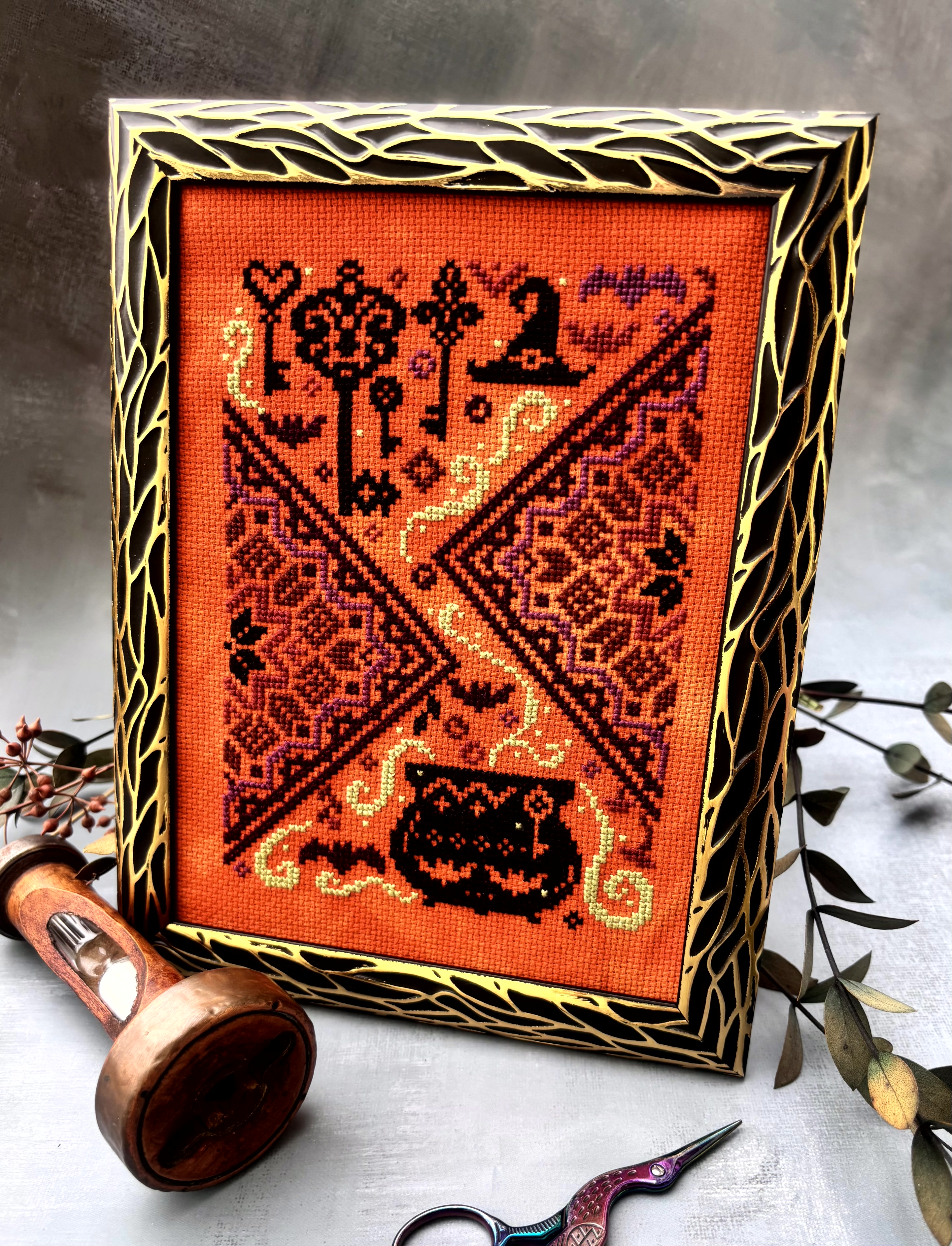 The Cauldron and the Key - Halloween Cross Stitch Pattern, different perspective #2, zoomed in. Select this picture to zoom back out.