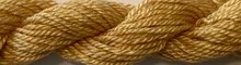 Dinky Dyes Jumbuck Thread - Aussie Gold Light , zoomed in. Select this picture to zoom back out.