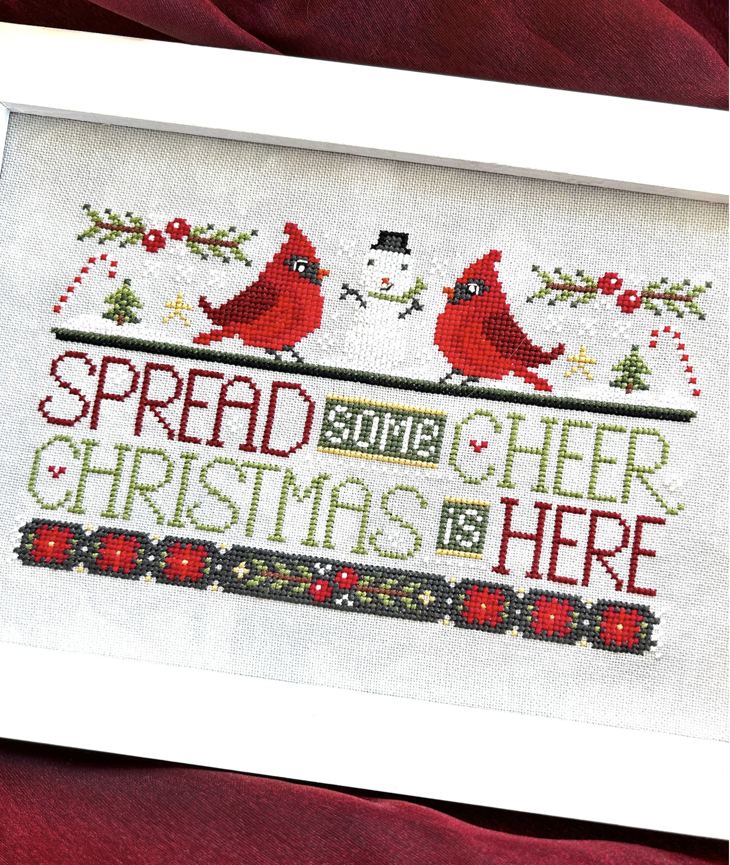 Wordy Birds: December - Christmas Cross Stitch Pattern, zoomed in. Select this picture to zoom back out.