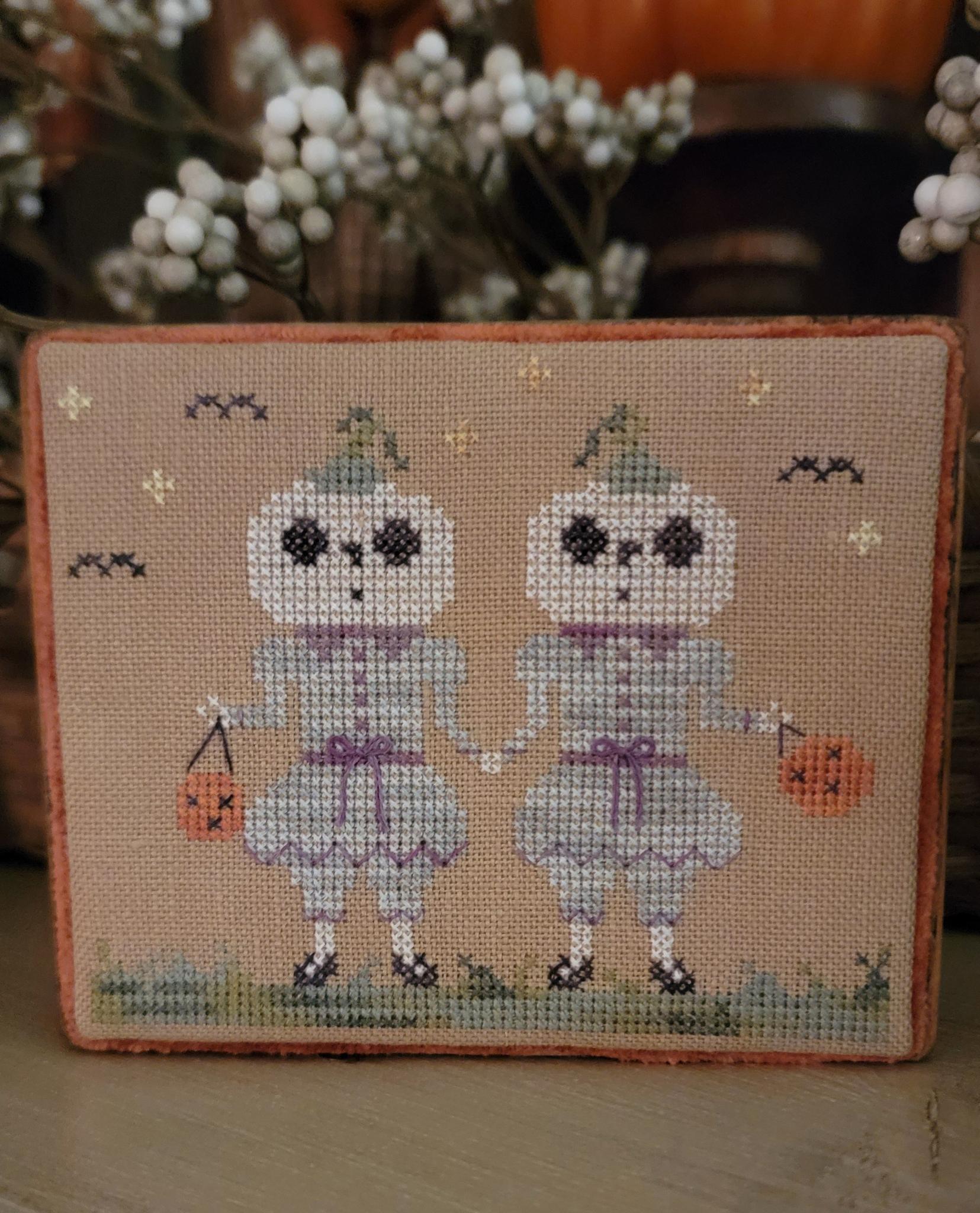 Trick or Treat Cove: Opal & Pearl - Halloween Cross Stitch, zoomed in. Select this picture to zoom back out.