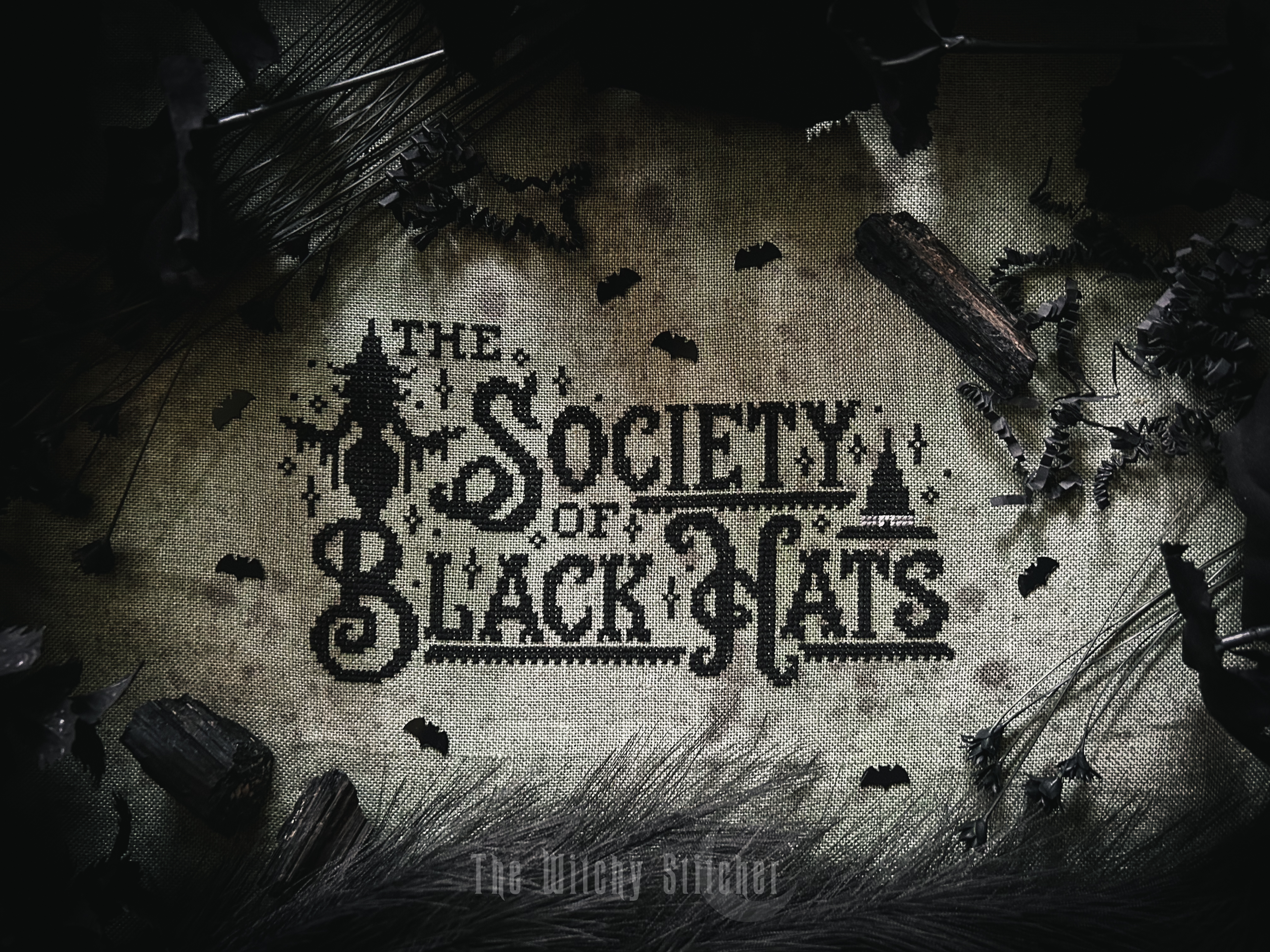 The Society Of Black Hats Halloween PDF Cross Stitch Pattern, zoomed in. Select this picture to zoom back out.