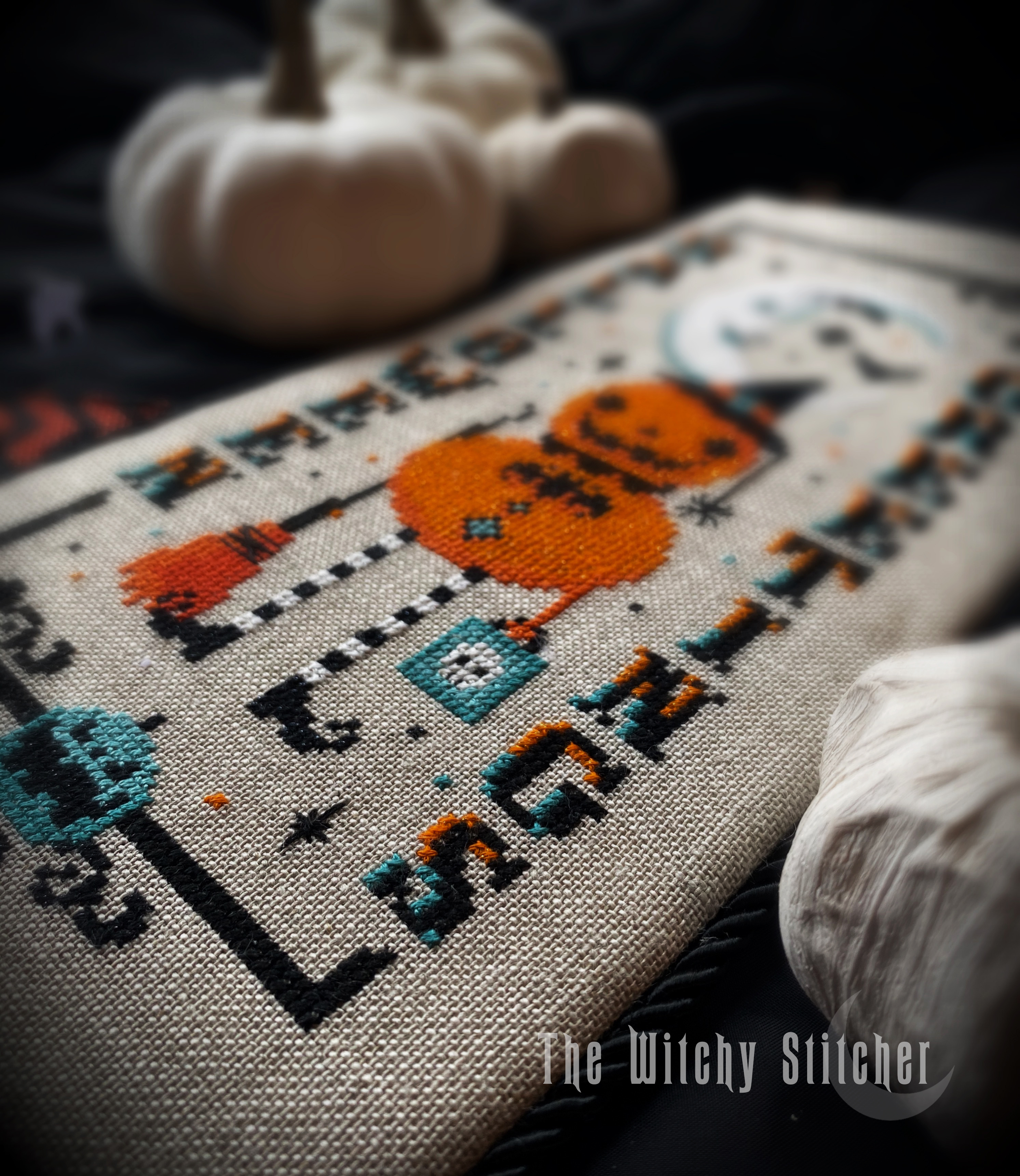 Vintage Pumpkin Witch - Halloween Cross Stitch Pattern, different perspective #2, zoomed in. Select this picture to zoom back out.
