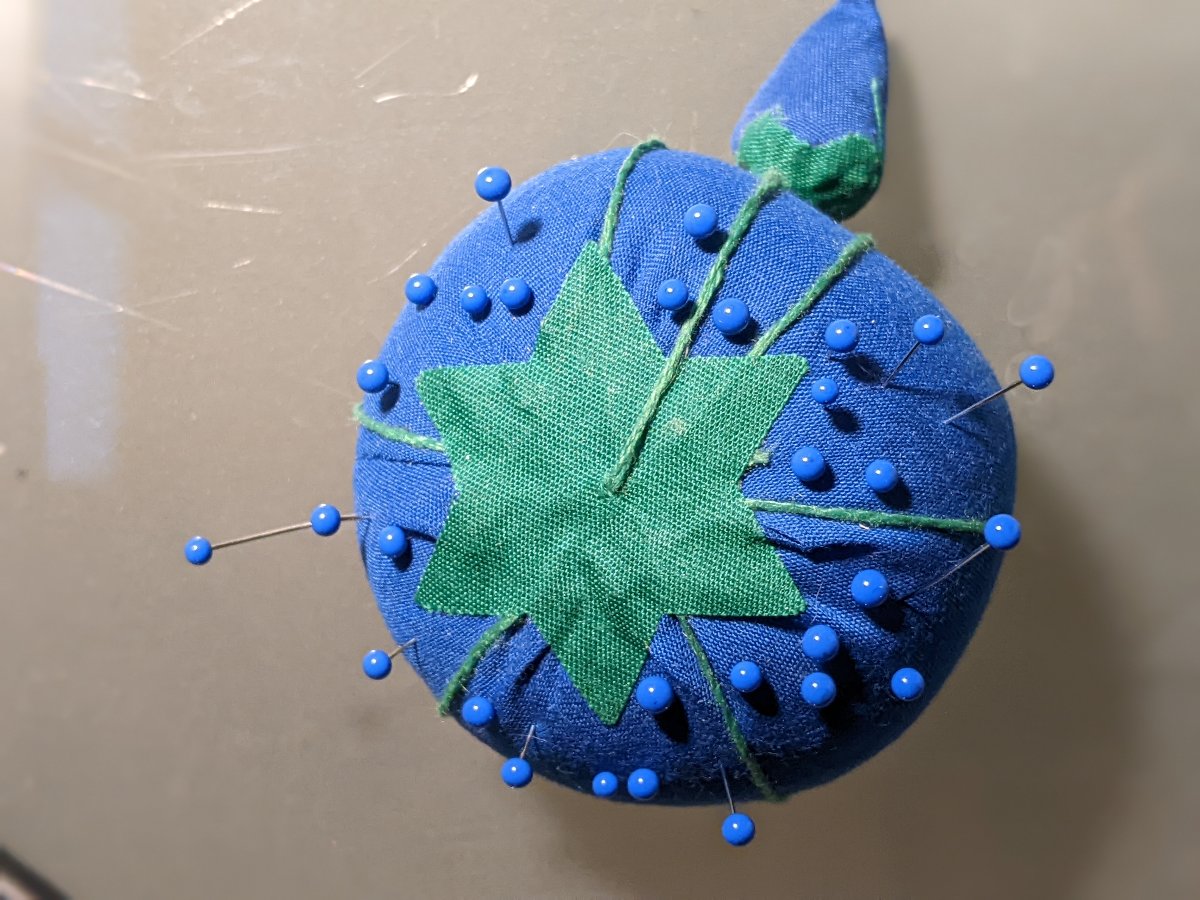 A customer's finished Tomato Pin Cushion - 1 Cushion, zoomed in. Select this picture to zoom back out.