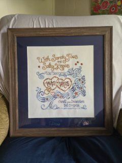A customer's finished Salty Kisses Wedding (14 Count) - Cross Stitch Kit. Select this picture to zoom in